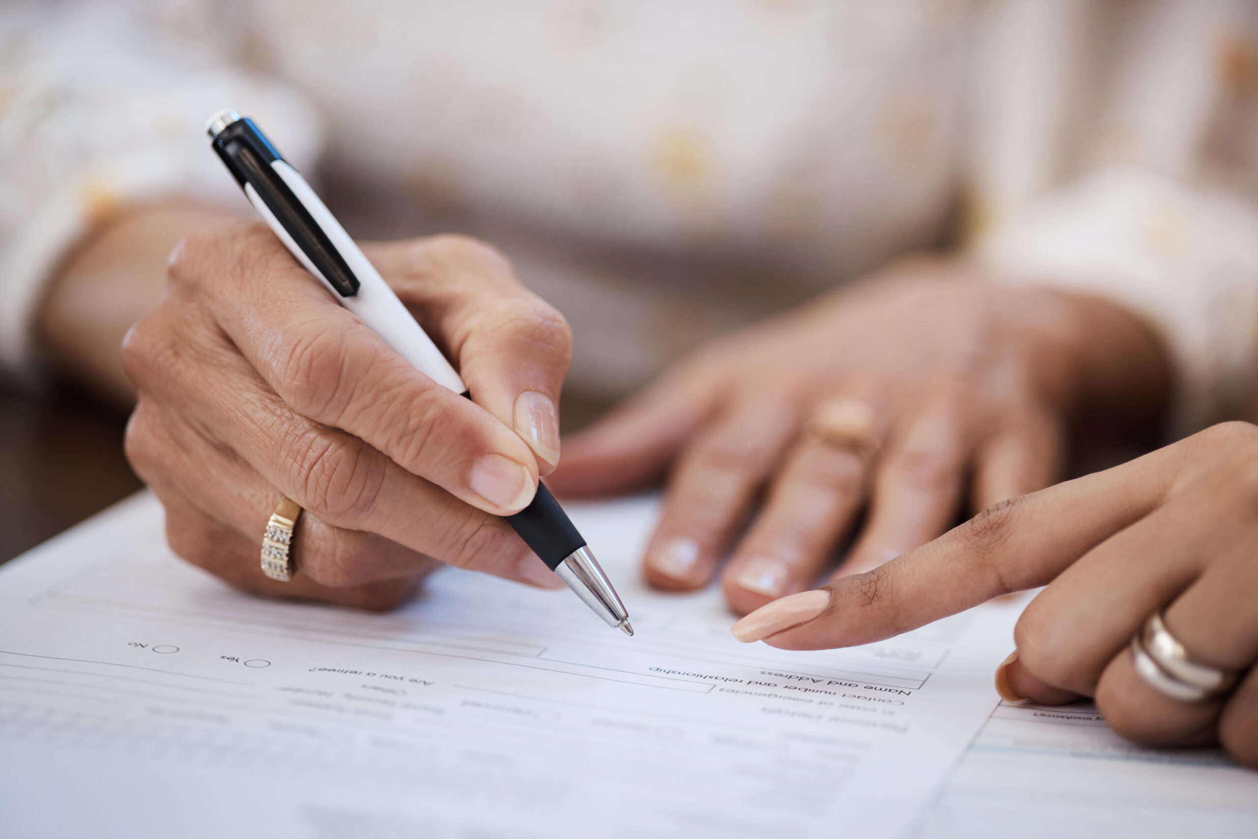 Woman-Hands-Signing-Doc-with-Pen-dpwoodlaw-donna-philip-Collin-County-Dallas County-Denton County-Tarrant County